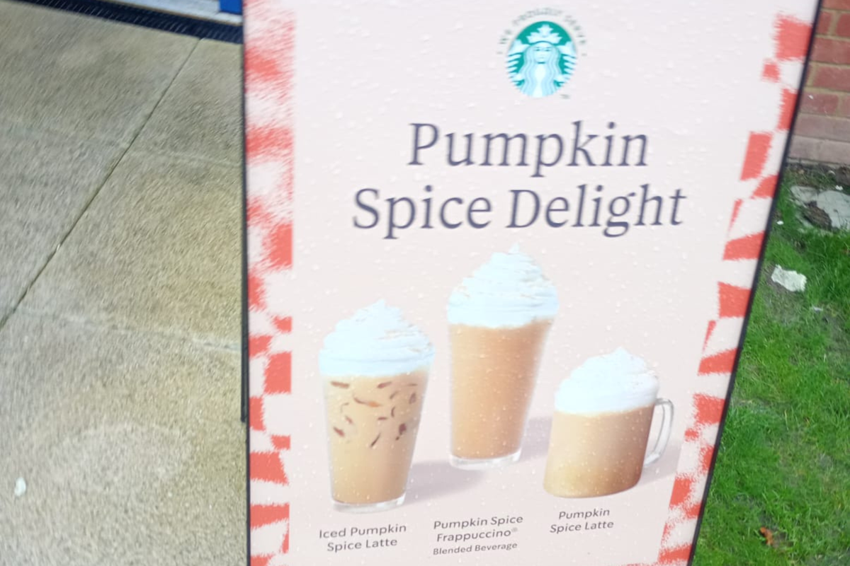 A photo of an A Board sign outside a Starbucks at a sixth-form college, selling drinks such as the Pumpkin Spice Coffee Frappuccino, which contains a whopping 12 teaspoons of sugar.png